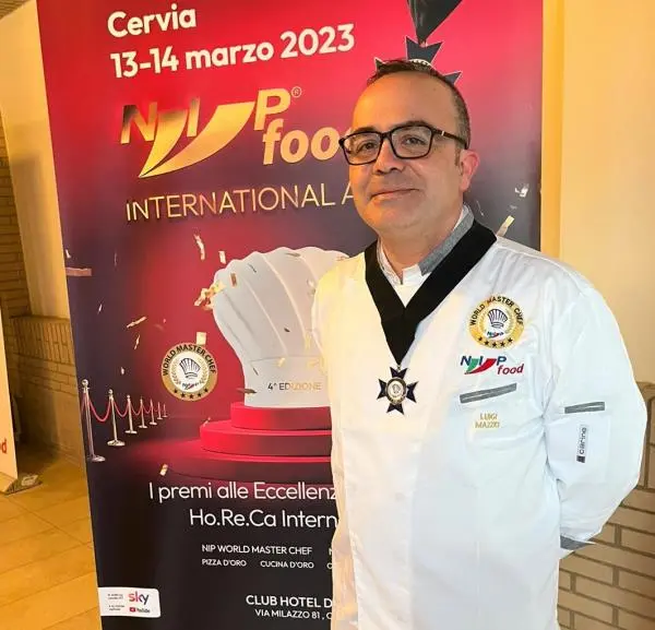 images Al catanzarese Luigi Mazzei la Croce ufficiale della Nip World Masterchef