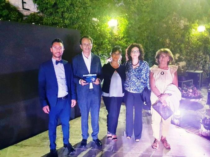 Consolidal premiata al "Festival del sociale" per l'impegno verso le famiglie durante la pandemia: targa al segretario nazionale Bulotta